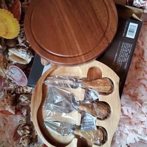 7" round chees board from Tuscany . Stainless stea